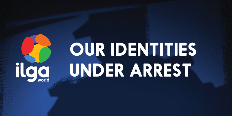 The shadow of a person with a hat looms in the dark, over a couple peacefully sleeping in their bed. The image reads "Our identities under arrest', and shows the ILGA World logo