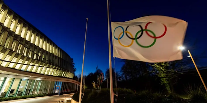 A night photo of the Headquarters of the International Olympic Committee IOC in Lausanne, Switzerland