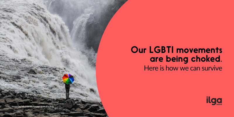 A person holding an umbrella in rainbow colours stands at the edge of a large, threatening waterfall. Text reads: "Our LGBTI movements are being choked. Here is how we can survive". The ILGA World logo is placed at the bottom right of the image.