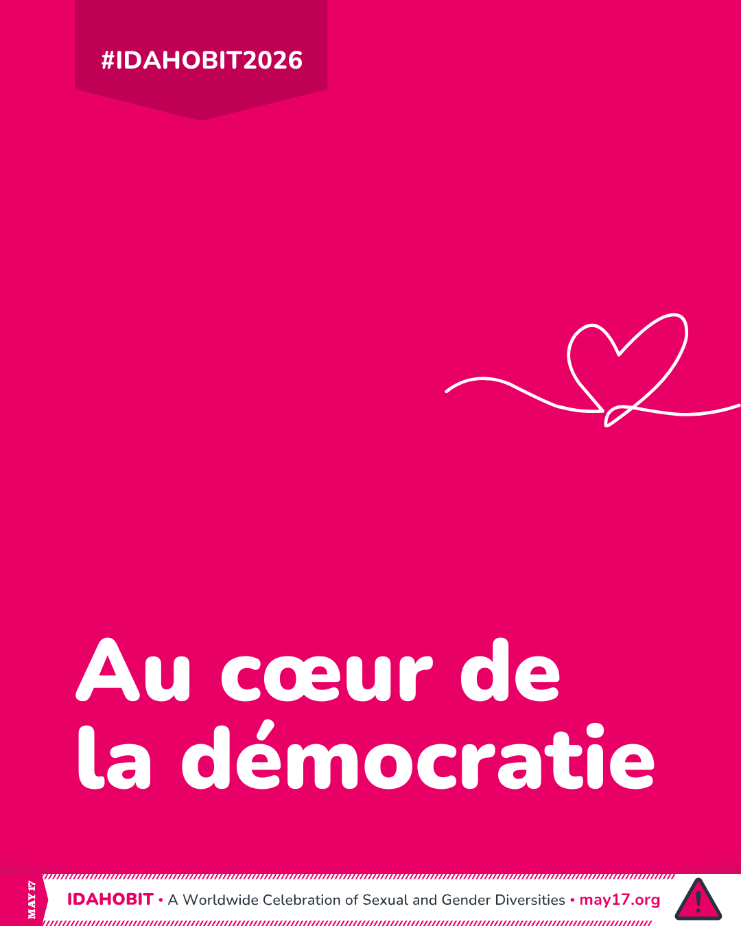 Un dessin représentant un cœur avec le texte suivant : « Le thème de l'IDAHOBIT pour 2026 sera « Au cœur de la démocratie ».