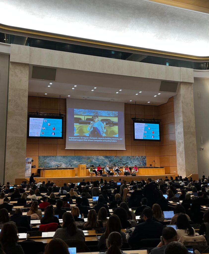Panellists of the Opening Session of the Forum pose on thethe stage of the Assembly Hall at the Palais de Nations in Geneva, Switzerland.