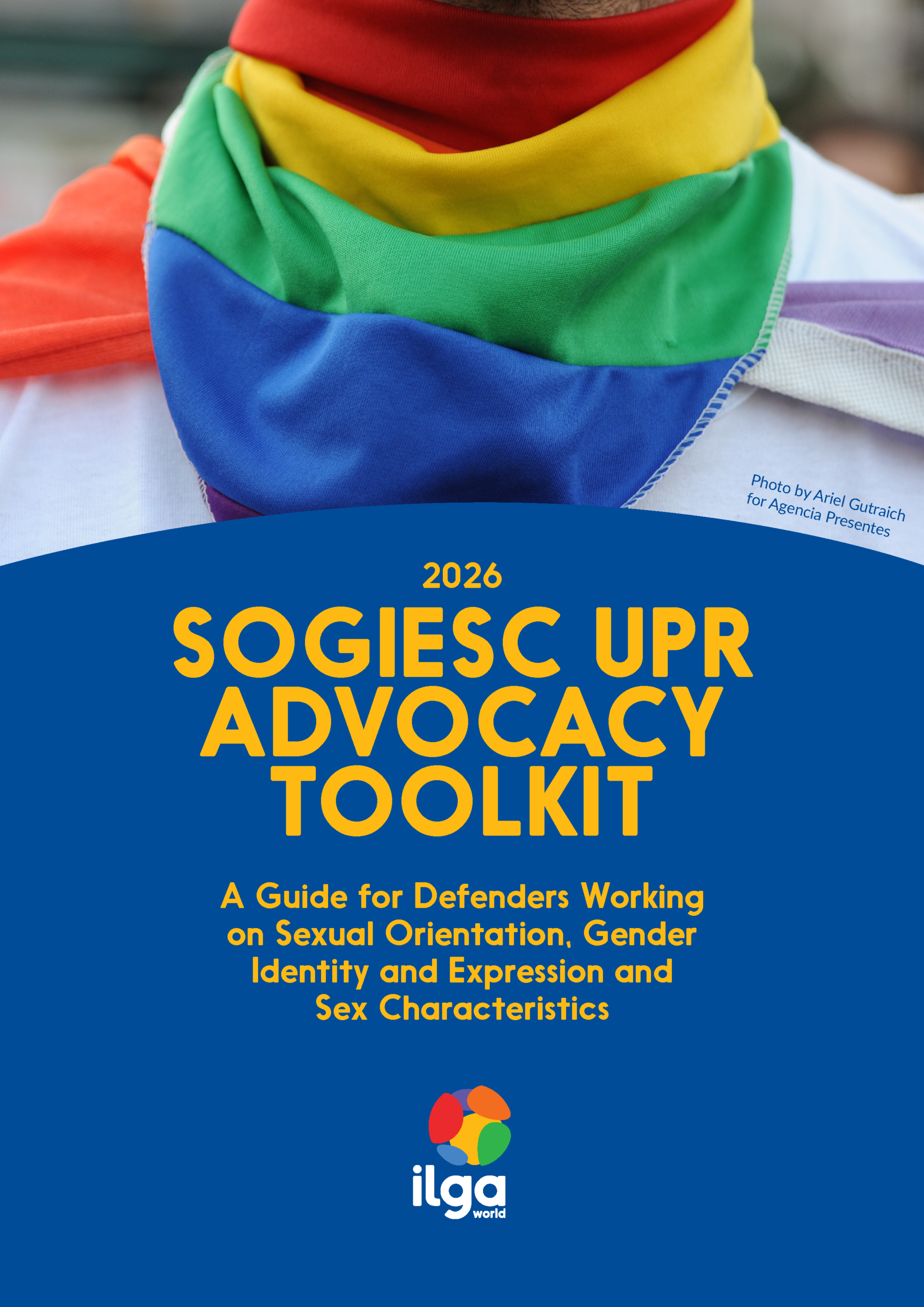 Cover of a 2026 ILGA World publication titled 'SOGIESC UPR Advocacy Toolkit: A Guide for Defenders Working on Sexual Orientation, Gender Identity and Expression and Sex Characteristics.' Close-up photo of a person wearing a rainbow-colored bandana around their neck, set against a dark blue background with yellow text, and the ILGA World logo